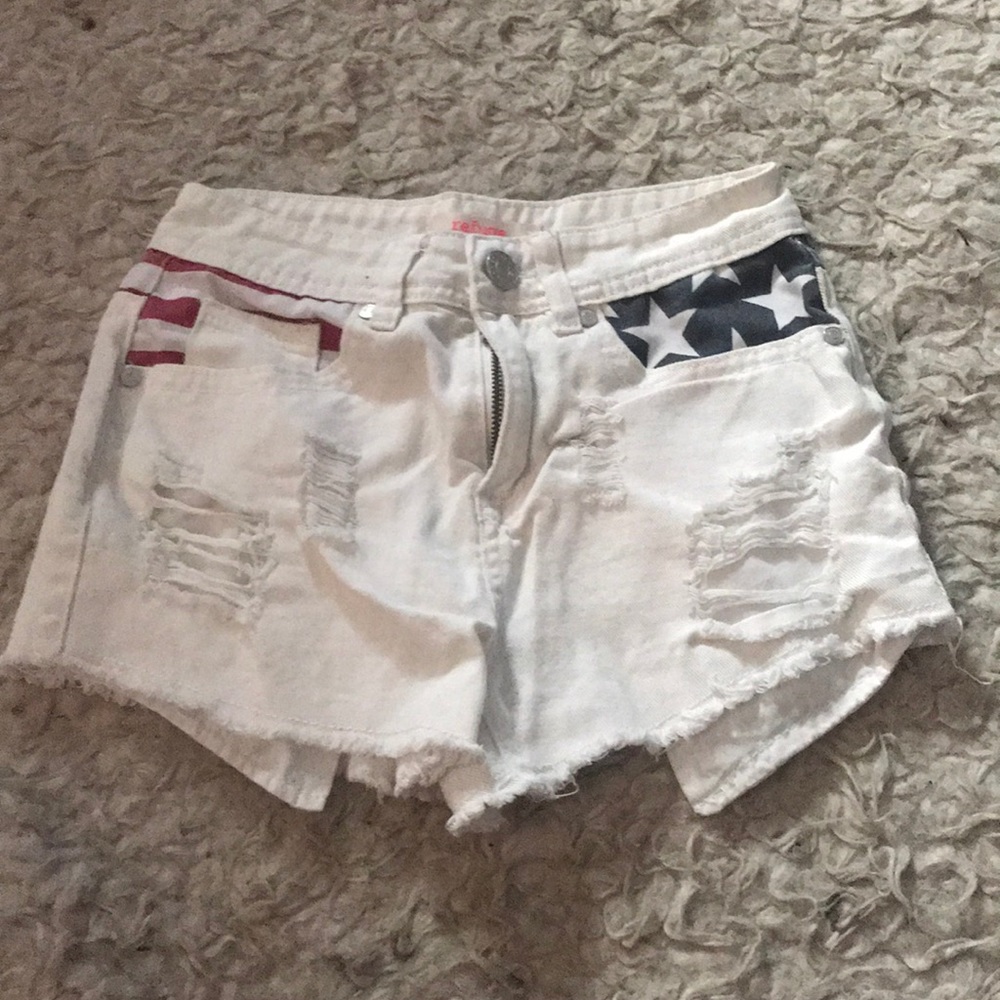 White distressed shorts